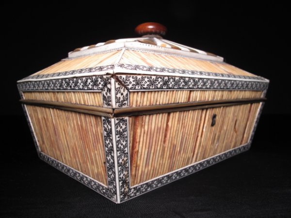 ANTIQUE ANGLO INDIAN PORCUPINE QUILL IVORY HORN: Antique Anglo-Indian box, 19th Century, decorated with porcupine quills, ivory, bone, and horn. Primary wood is a dense, pungent wood, possibly camphor. Height: 6 1/2". Width: 10 1/2". Depth: 7 3/4" a
