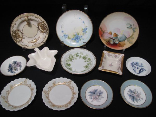 TWELVE ASSORTED PORCELAIN DISHES LIMOGES WORCESTER: Twelve assorted dishes including some by Limoges, Royal Worcester, Royal Copenhagen, and Royal Rudolstadt. Largest measures 6' in diameter. Smallest measures 3 3/4" in diameter. Total weight: 2.6 lbs.