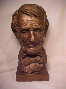 VINTAGE BUST ABE LINCOLN 10" high by 4: VINTAGE BUST ABE LINCOLN 10" high by 4 1/2" wide by 4" deep. Bronze patina over gesso. Chip to rear.