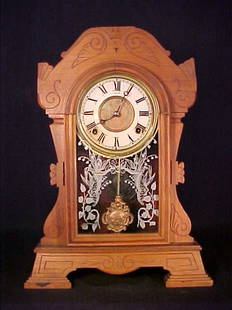 ANTIQUE CARVED WOOD MANTLE CLOCK 19" tal: ANTIQUE CARVED WOOD MANTLE CLOCK 19" tall by 13" wide and 5" deep.