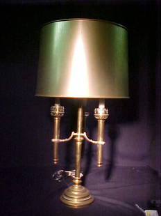 VINTAGE BRASS CANDLESTICK LAMP Measures: VINTAGE BRASS CANDLESTICK LAMP Measures 31" to top finial and 10" at widest point. Adjustable interior rod.