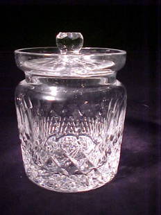 WATERFORD CRYSTAL BISCUIT BARREL Measure: WATERFORD CRYSTAL BISCUIT BARREL Measures 6 3/4" tall x 4 3/4" wide. Etched Waterford mark on base.