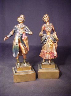 PAIR COLD PAINTED METAL VICTORIAN FIGURE: PAIR COLD PAINTED METAL VICTORIAN FIGURES 8 3/4" tall by 4" wide.