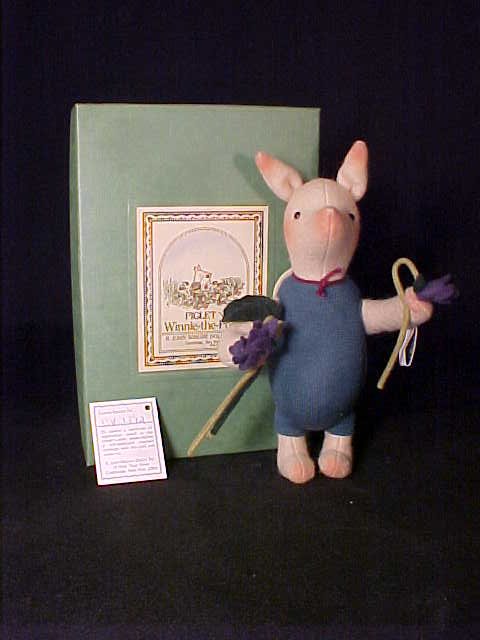 ORIGINAL R JOHN WRIGHT DOLL PIGLET Pigle: ORIGINAL R JOHN WRIGHT DOLL PIGLET Piglet with violets 1988-89, 7" standing, fully jointed. Limited Edition 1372 of 2500, Original box with certificate and papers.