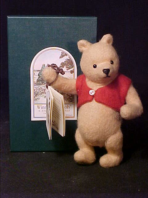 ORIGINAL R JOHN WRIGHT DOLL POCKET POOH: ORIGINAL R JOHN WRIGHT DOLL POCKET POOH 5" tall. Beige custom mohair plush, black shoe button eyes, black stitched nose and mouth, wearing red mohair plush vest, new in box, certificate of authenticit