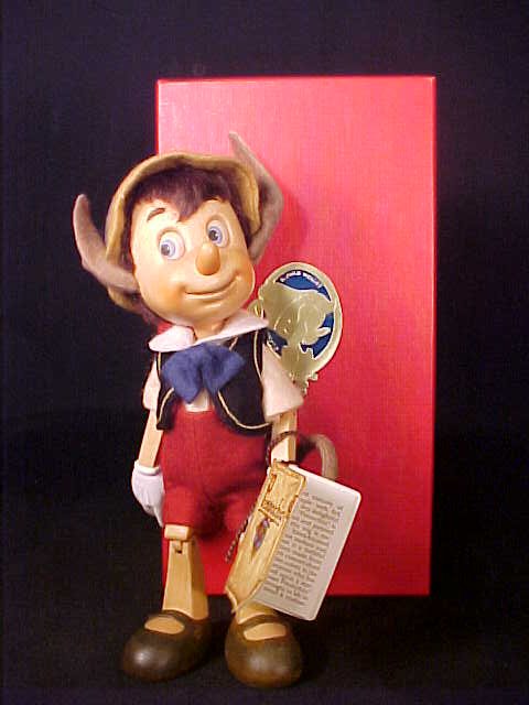 ORIGINAL R JOHN WRIGHT PINOCCHIO DOLL 9": ORIGINAL R JOHN WRIGHT PINOCCHIO DOLL 9" hand carved, fully jointed. Original box and all tags included. Number 181 of 250.