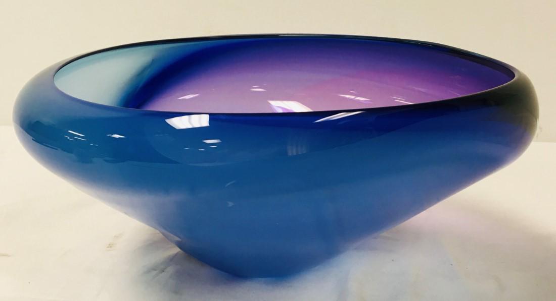 MICHELLE KAPTUR MODERNIST ART GLASS BOWL: Michelle Kaptur modernist art glass bowl. Measures 6.6" tall x a total of 13.75" wide. Signed on base "Kaptur". Condition: good, no damages, see images. Weight: 6.4 lbs.