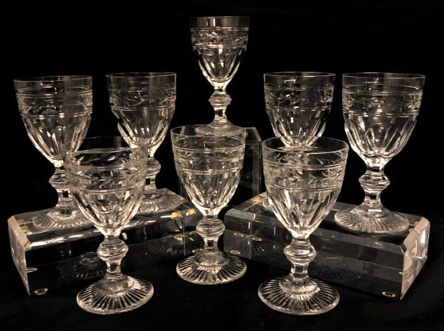 BACCARAT "JONZAC" RED WINE GLASSES 8 pcs: Lot of 8 Baccarat "Jonzac", aka "Laurel" pattern red wine glasses. Each stem measures 5.75" tall and is acid etched with circle mark in the center of the base. Condition: no chips or cracks, no foggin