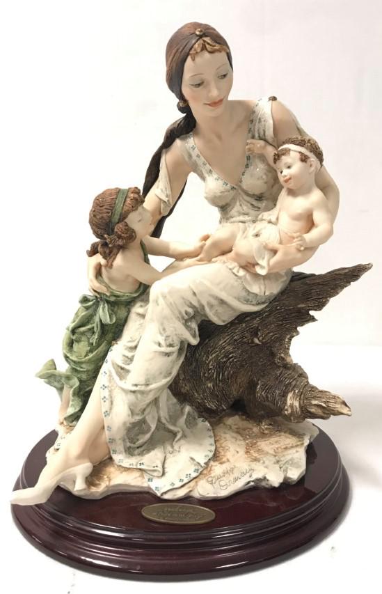 GIUSEPPE ARMANI FIGURINE "PRIDE AND JOY" #104C: Giuseppe Armani sculptural figurine titled "Pride and Joy" #104C. Marked with titled plaque at the front of base. Limited edition number 50/3000. Measures 15.5" tall. Condition: good, no signs of dama