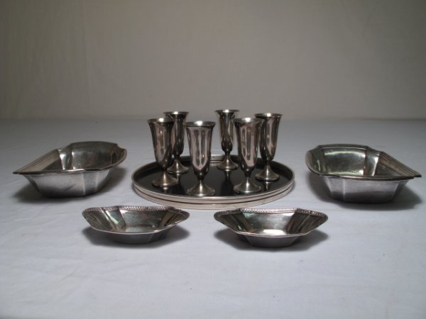 ELEVEN PIECES STERLING SILVER HOLLOW WARE GORHAM: Eleven pieces of sterling silver hollow ware including: a Gorham sterling and composite tray with six cordial glasses (diameter of tray: 7 1/2". Height of each glass: 2 3/4"); 4 bonbon dishes (larger 