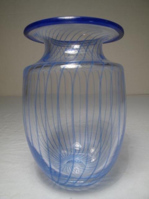 KOSTA BODA SWEDEN STUDIO ART GLASS VASE SIGNED: Kosta Boda, Sweden studio art glass vase with an etched artist's signature below the base. Late 20th Century. Decorated with navy blue vertical stripes and a cobalt blue glass rim. Height: 7 1/4". Wid