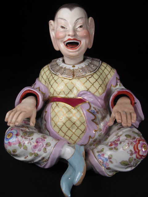 ANTIQUE MEISSEN PORCELAIN CHINAMAN NODDER c1860s: Antique Meissen, Germany hand painted Chinaman "nodder". Moving hands and tongue. Original lead weight. Height: 6". Width: 6". Depth: 5 1/2". Weight: approximately 0.6 lbs. Crossed swords mark and imp
