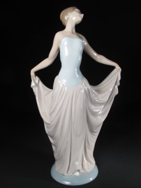 LLADRO PORCELAIN FIGURINE "DANCER" #01005050 1979: Lladro porcelain figurine entitled, "Dancer", designed by Vincente Martinez in 1979. Figure # 01005050. Height: 11 3/4". Width at widest point: 7". Weight: 2.3 lbs. Condition: good (without box).