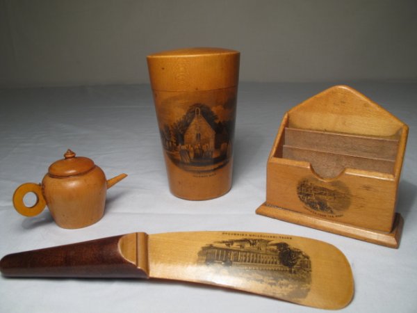 FOUR PIECES MAUCHLINEWARE FOUR VIEWS EDINBURGH: Four pieces of late 19th Century treen wood mauchline ware depicting scenes in the British Isles including: Edinburgh, Ventnor (Isle of White), Alloway Kirk (Scotland), and Pensafn (Wales). Largest pi