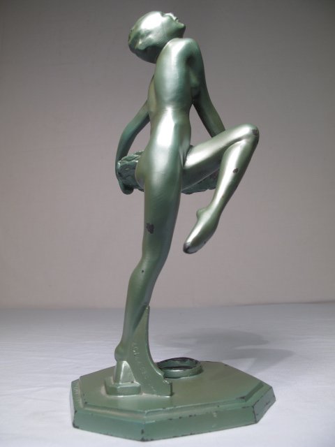 FRANKART DECO NUDE FIGURE CELADON FINISH: Frankart deco nude figure celadon finish. Missing glass vase with some paint loss. Stamped on side "c" Frankart 27. On side of leg, Pat.des77197. Measures 10 inches tall by 6 inches wide by 5.5 inches