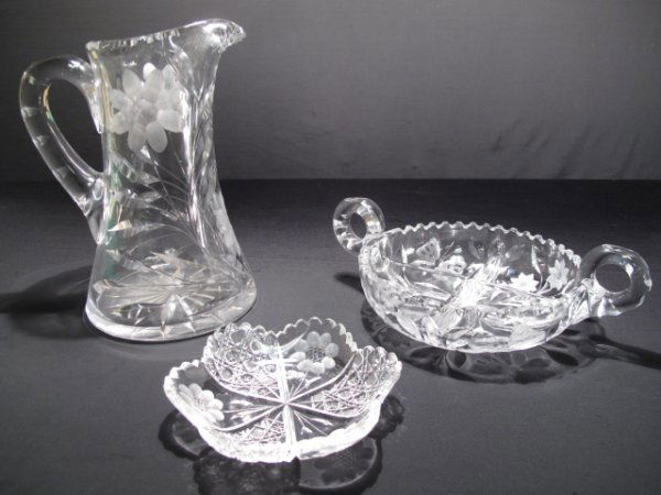 3 PCS AMERICAN BRILLIANT CUT GLASS: 3 pieces of American brilliant cut glass including a large water pitcher, handled sectional dish with butterfly pattern, and small serving dish. Largest is the pitcher at 10 1/4" high and smallest is