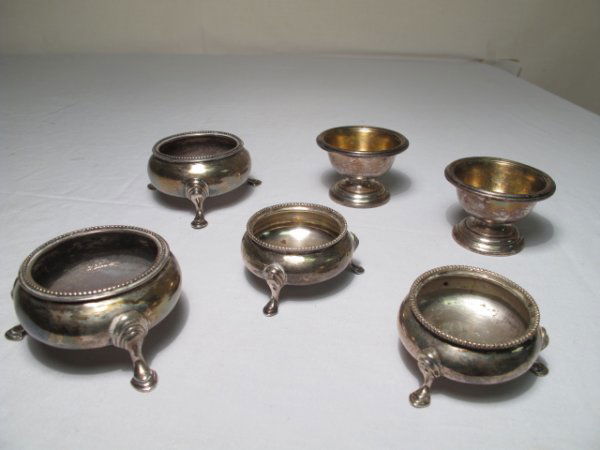 STERLING SILVER SALT CELLARS 6 PC: Six sterling silver salt cellars. Three pairs. Largest measures 3" x 1 3/" tall. Smallest is 2" x 1 1/4" tall. No liners. See images. Total troy weight is 12 t.oz
