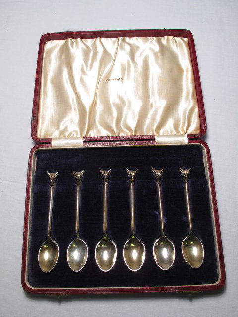 ENGLISH STERLING SILVER COFFEE SPOONS FOX HEAD FIN: Boxed set of English sterling silver coffee spoons with fox head finials and gilt washed bowls. Each stamped Made in England with hallmarks. Each measures 3 3/4" long. Total troy weight is 3 t.oz. Ori
