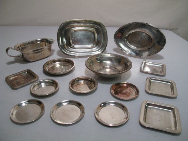 STERLING SILVER TABLEWARES - 15 PIECES: Assorted sterling silver tablewares include a gravy and under plate, which measures 7 1/4" long by 5 1/2" wide and 2 1/2" tall, several small round trays, four small square trays, a small bowl, a wine