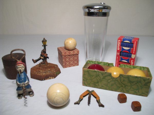 BOTTLE OPENERS IVORY BILLIARD BALLS POKER CHIPS ET: An estate lot consisting of two vintage figural bottle openers, a vintage iron ash tray, two antique ivory billiard balls, a set of Carom or three-cushion billiard balls, a 68 piece poker chip set, a