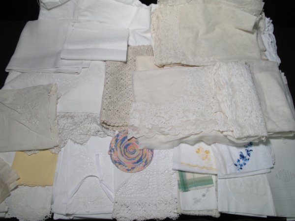 ASSORTED ESTATE LINENS: One of four lots of Estate linens. Mixed lots including an assortment of various vintage linens: large and small tablecloths, tea towels, linen towels, handkerchiefs and more. All freshly washed and p