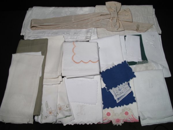ASSORTED ESTATE LINENS: One of four lots of Estate linens. Mixed lots including an assortment of various vintage linens: large and small tablecloths, tea towels, linen towels, handkerchiefs and more. All freshly washed and p