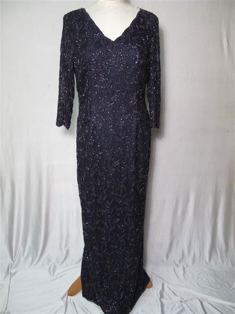 STENAY NAVY BLUE FULL SEQUINED EVENING GOWN: Stenay navy blue full sequined evening gown. Sweetheart net, 3/4 sleeves. Floral design in purple iridescent and black bugle beads. Sheath style kick pleat in back. 55 inches long. Sleeves are 17.5 in