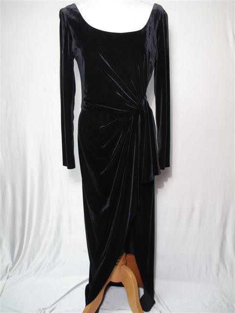 JEFFREY AND DAVE VELVET BALENCIAGA DESIGN GOWN: Jeffrey and Dave velvet Balenciaga Design gown. 1970s side draped velvet gown in very good condition. Back zip, original label, with scoop neck. Sleeves measure 22 inches long. Shoulder to hem is 57 i