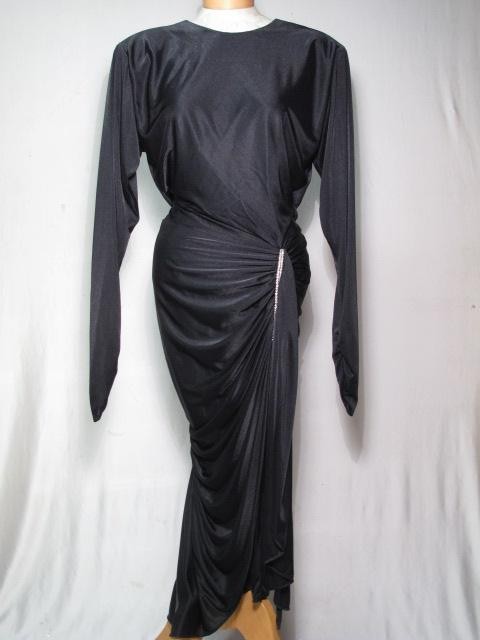 VINTAGE NIGHT MOVES BY HAL FITTED EVENING GOWN: Vintage Night Moves by Hal fitted evening gown. Size 11/12. Side wrap with rhinestone embezzlement at hip, in draped design. Good condition. Shipping weight 5 lbs.
