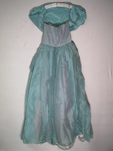VINTAGE 1950S COQUETTE ORIGINAL AQUA ORGANZA GOWN: Vintage 1950s Coquette original aqua organza gown with matching bolero jacket. Side zipper on dress, shirring across breast. Some damage to the bottom of the gown, see pictures. Frays and tears throug