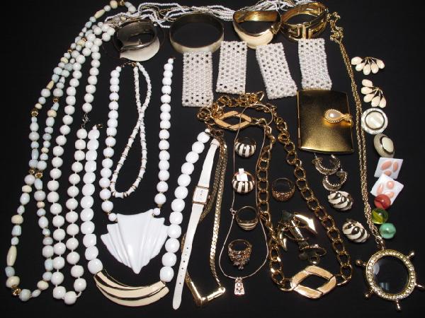COSTUME JEWELRY NAPIER MONET TRIFARI ETC: Large group assorted costume jewelry including signed and unsigned items. Designers included: Napier, Monet, Trifari, includes a nice assortment of bracelets, necklaces and earrings. Faux pearls, naut