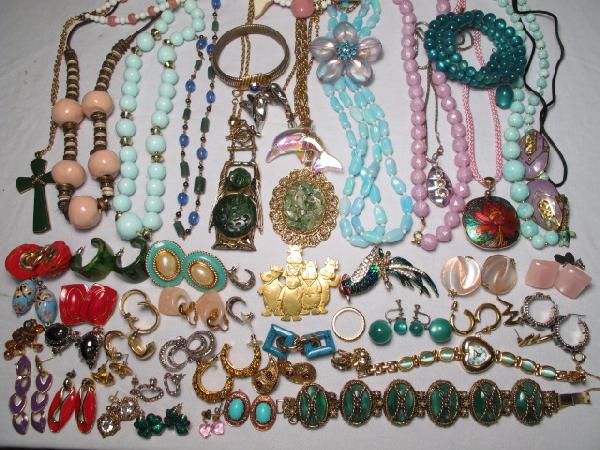 COSTUME JEWELRY MONET REED AVON BEREBI JUDY JJ ETC: Large group assorted costume jewelry. Some signed, some unsigned. Designers include Monet, Reed, Berebi, Judy, JJ, Avon etc. Includes many sets of earrings, clip and pierced, Faux Jade, fashion watch,
