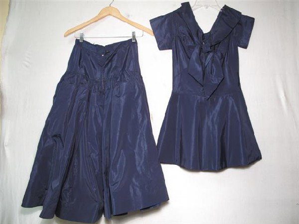 VINTAGE DIOR DESIGN 2 PIECE A LINE DRESS: Vintage Dior Design 2 piece A-line dress. 2 piece navy faille a-line dress, Dior Design. Made up of gathered skirt on yolk. Fitted A-line top with cowl, self tied collar. Size 6. No rips or tears. Som