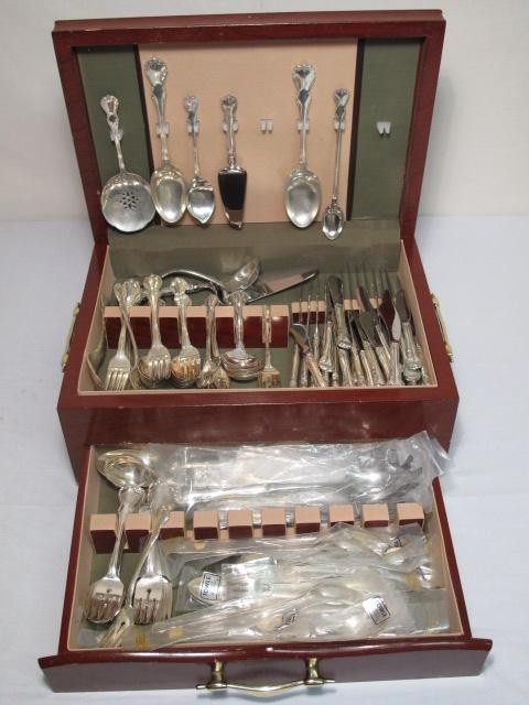 TOWLE STERLING SILVER FLATWARE SET 136 PC: 1948 French Provincial Towle sterling silver flatware set with original wooden case and literature. Total of 136 pieces. Longest spoon measures 8.25", the longest fork is 7.5", and the longest knife i