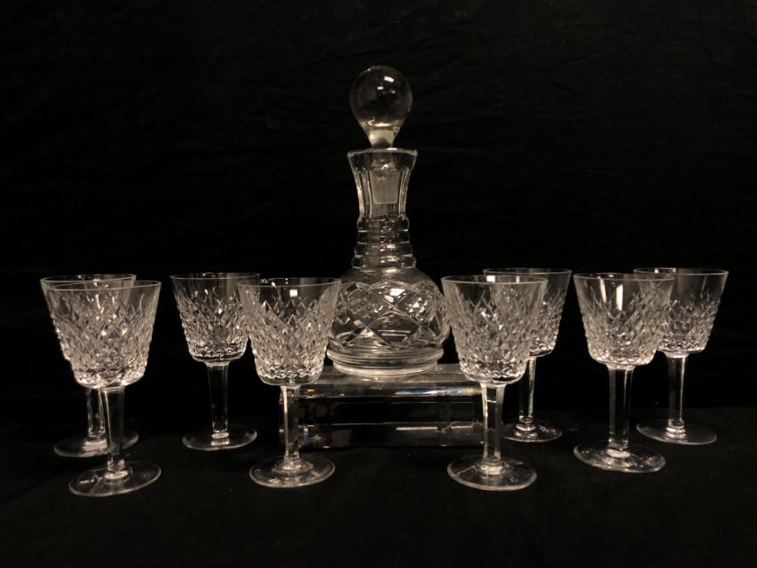 WATERFORD CRYSTAL LOT, 9 PIECES: Lot includes: 8 Waterford Alana crystal claret wine glass goblets stemmed, H 5 7/8 " and one Waterford decanter missing its original stopper but having a replacement stopper, 8.25" H of Waterford only
