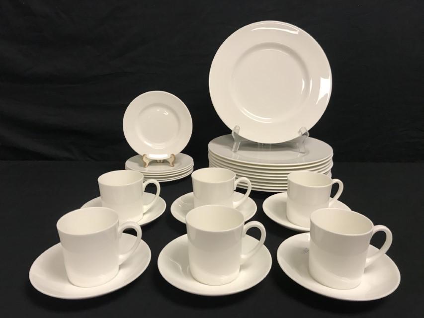 WEDGWOOD WHITE BONE CHINA DINNERWARE: 28 PCS: Wedgwood White bone china dinnerware. Includes 28 pieces: (10) 10.75" plates, (6) 6" plates, (6) 5.75" saucers, and (6) 3" tall cups. Each piece marked on base. Condition: one cup with chips and crack