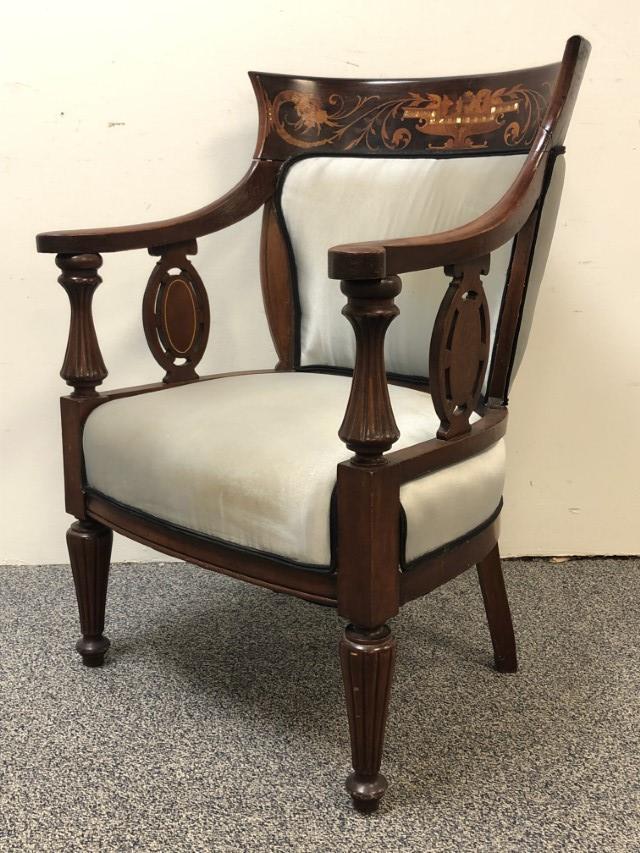 EDWARDIAN INLAID MAHOGANY OPEN ARMCHAIR, C.1900: H 37.5", W 21", D 27", fruitwood with mother-of pearl inlaid horn, compote planter, floral, foliate and vine curved back crest rail, satinwood string inlay on the oval medallion arm supports, raised o