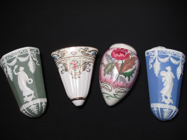 JASPER AND OTHER WALL POCKETS 4 PCS: Group lot assorted wall pockets. Two Wedgewood style, and two Nippon wall pockets. Hand painted and gilt on the Nippon. Good condition, no damages. Largest measures 7.5" tall x 4" wide. Smallest measu