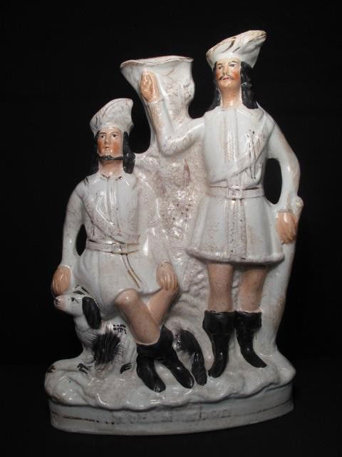 LG 19TH C STAFFORDSHIRE FIGURE: ROBIN HOOD: Large 19th century English Staffordshire figurine titled "Robin Hood". Measures 13" x 9" x 3". Condition: restoration, see images. Shipping weight 4.3 lbs.