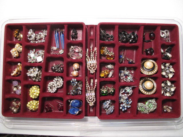 ASSORTED COSTUME JEWELRY EARRINGS TRIFARI: Tray lot of assorted costume jewelry - earrings. Brands such as Trifari, Monet, Weiss, and more. Includes faux gems, faux pearls, enamel, rhinestones, gold toned, silver toned, more. All in good condi