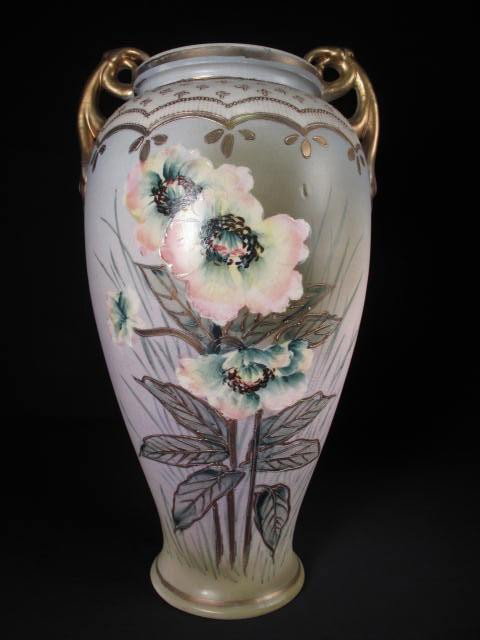 LARGE NIPPON MORIAGE FLORAL VASE: Large Nippon moriage floral vase. Hand painted and gilt. Two handles on each side. Marked "Hand painted Nippon" on bottom. Good condition, some crazing, see images. Measures 13" tall x 7.5" wide. Ship