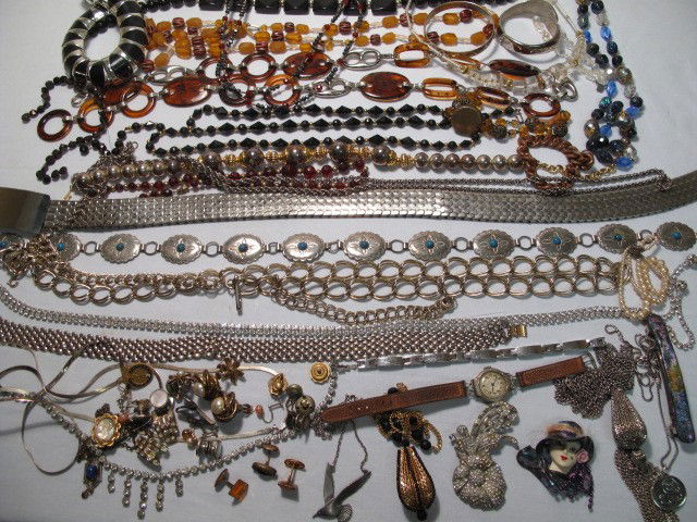TRAY LOT ASSORTED LADIES COSTUME JEWELRY STERLING: Tray lot of assorted ladies costume jewelry. Brands such as Avon, Trifari, Monet and more. Necklaces, rings, earring, bracelets, watches, etc. Includes gold toned, silver toned, Sterling silver, stone