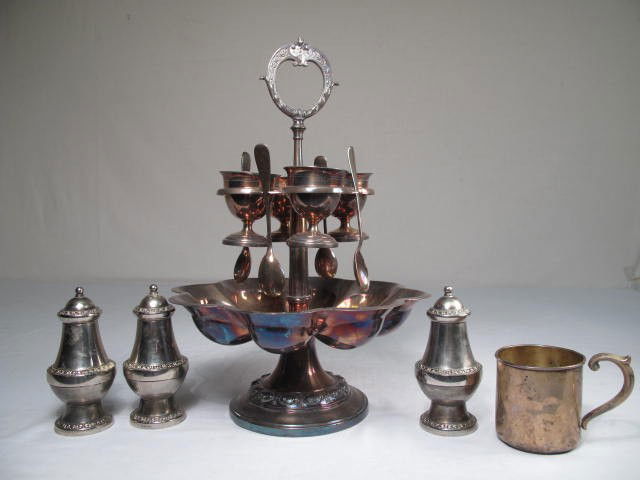 SILVERPLATE & STERLING ITEMS: EGG CRUET, SHAKERS,: Lot of silverplate and Sterling silver items. Includes a Victorian silverplate egg cruet set: stand egg tray, four egg cups, and 4 spoons. Three silverplate salt & pepper shakers, and a Sterling cup.