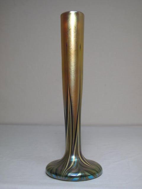 ORIENT & FLUME PULLED FEATHER VASE: A tall, slender Orient & Flume iridescent vase with fine pulled feather design. Measures 11 1/2" tall. Condition good. Shipping weight 1.5 lbs.