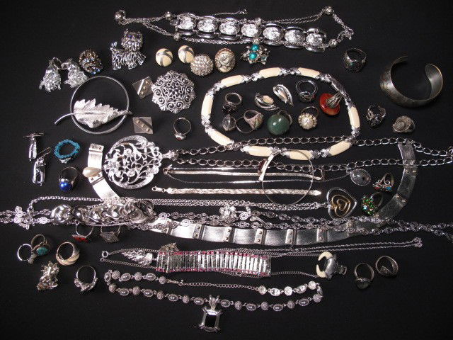 COSTUME JEWELRY: CORO MONET AVON AND MORE: Tray lot of assorted costume jewelry. Coro, many Monet, Avon, Sarah Cov., one Worthington necklace etc. Rings, earrings, bracelets, necklaces and brooches. One small silver bracelet. Good condition. W