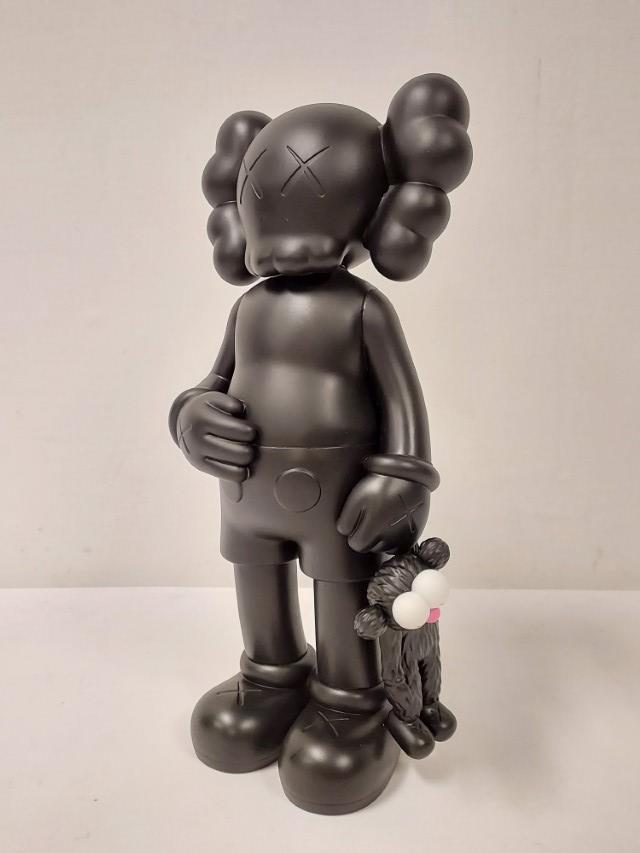 KAWS COMPANION BLACK VINYL SCULPTURE: SHARE: KAWS Companion black vinyl sculpture, "Share". Measures 12" tall. No box included. Signed on the foot. Good condition but for a few small blemishes to finish, see images. Weight: .8 lbs.