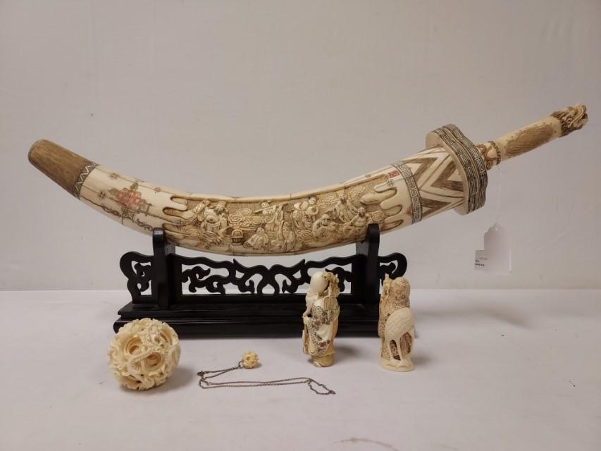 5 CHINESE CARVED BONE DECORATIVES: DAGGER, FIGURES: Lot of five Chinese carved bone decoratives. Includes two small 4" carved figures, a dagger with elaborately decorated sheath on stand (total length 28.5"), a 2.65" diameter puzzle or mystery ball, an