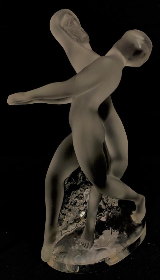 LALIQUE 'DEUX DANSEUSES' CRYSTAL SCULPTURE: LALIQUE 'DEUX DANSEUSES' CRYSTAL SCULPTURE. This model is one of a series of nude dancer figurines originally designed by Marc Lalique in 1960 The design is no longer in production. Signed "Lalique Fr