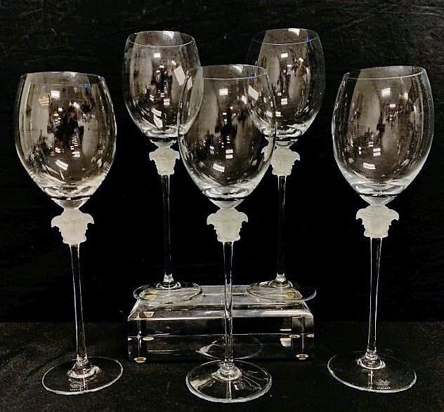 VERSACE CRYSTAL MEDUSA LUMIERE WINE STEMS 5 PCS: Lot of five Versace "Medusa Lumiere" red wine stems by Rosenthal. Each one measures 11" tall. Marked on foot. Condition: good, no chips, no cracks, no fogging or scratches, see images. Weight: 2 lbs.