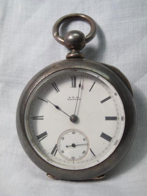A GENTLEMANS POCKET WATCH: KEY WIND COIN ELLERY: Size 18 key wind pocket watch with AW Co. Roman numeral dial, Bartlett movement #2076074 in a coin silver hunter case. Condition: winds easily, running. (We do not guarantee the condition on timepiece
